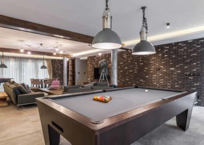 Interior of a luxury living room with billiard table